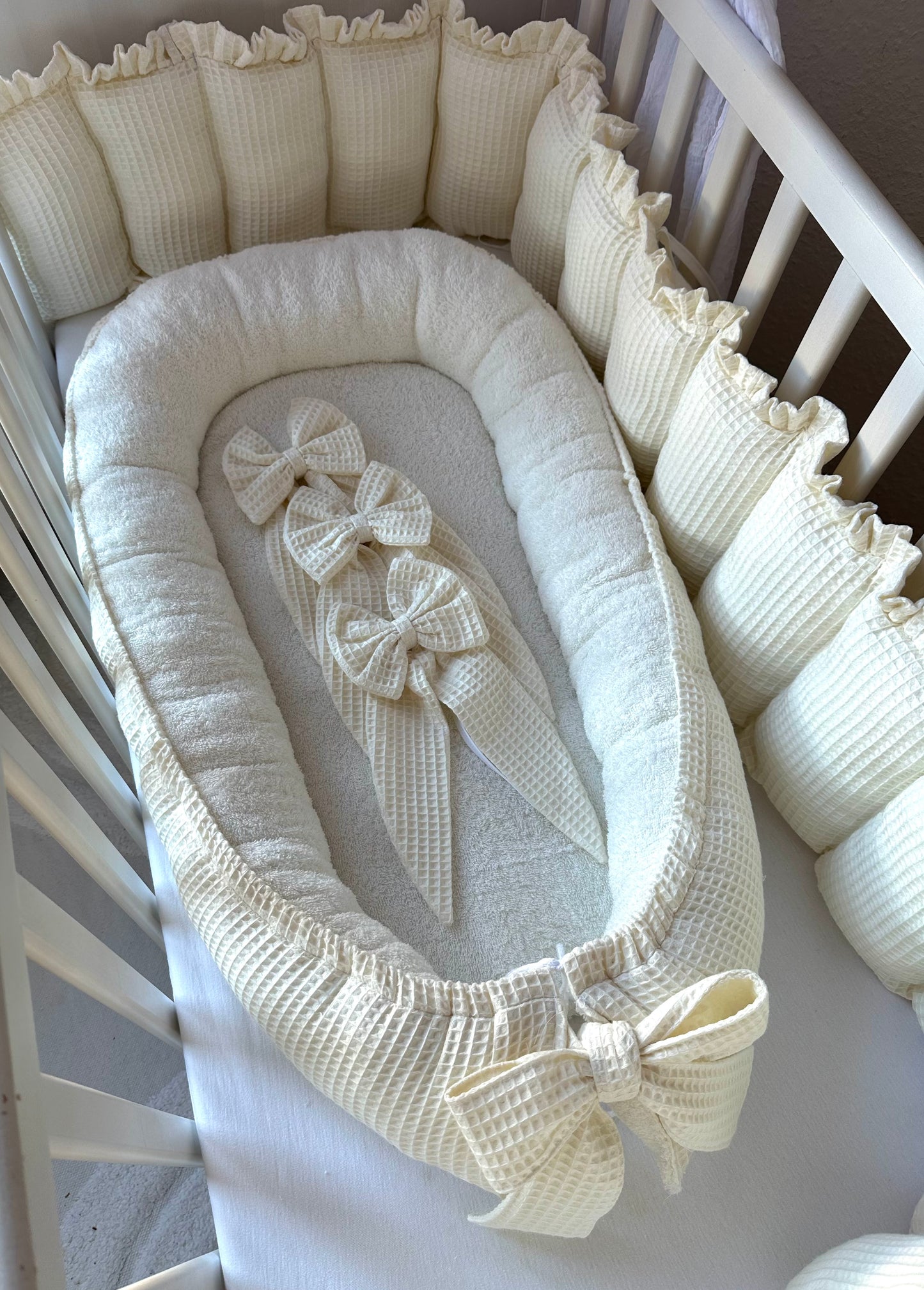 Bettumrandung aus Waffelpiqué Nestchen